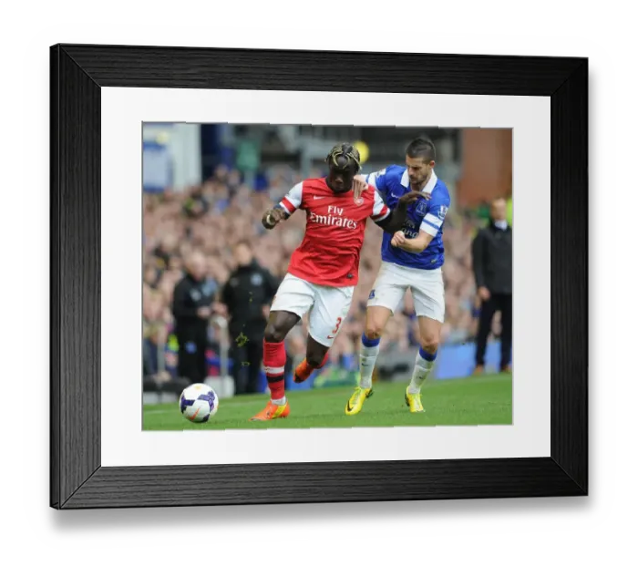 Framed Print : Intense Battle: Sagna vs. Mirallas - Premier League Showdown, 2013 / 14
