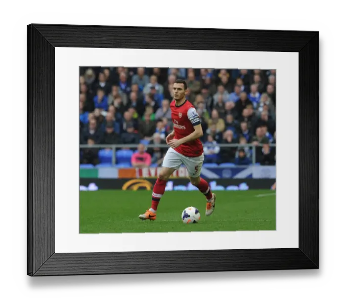 Framed Print : Thomas Vermaelen's Unwavering Focus: Everton vs Arsenal, Premier League 2013-2014 Framed Print : Thomas Vermaelen's Unwavering Focus: Everton vs Arsenal, Premier League 2013-2014