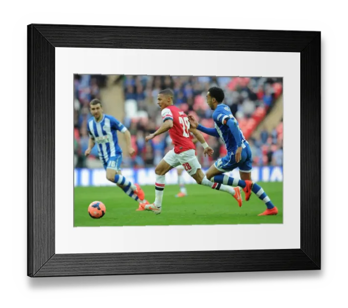 Framed Print : Arsenal's Kieran Gibbs Faces Off Against Wigan's James Perch in FA Cup Semi-Final Showdown