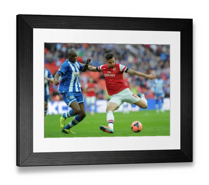 Framed Print : Giroud vs. Boyce: Intense Moment at the FA Cup Semi-Final between Arsenal and Wigan