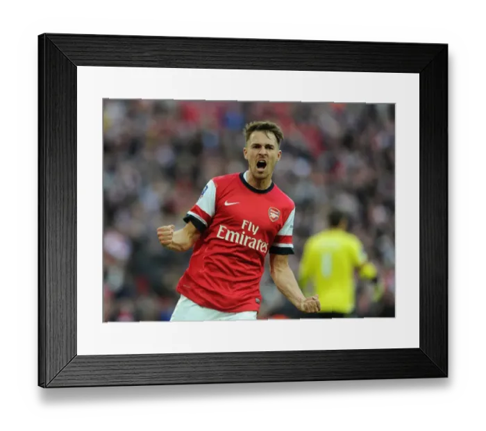 Framed Print : Aaron Ramsey's Euphoric Moment: Arsenal's Thrilling Goal vs Wigan Athletic, FA Cup Semi-Final 2014