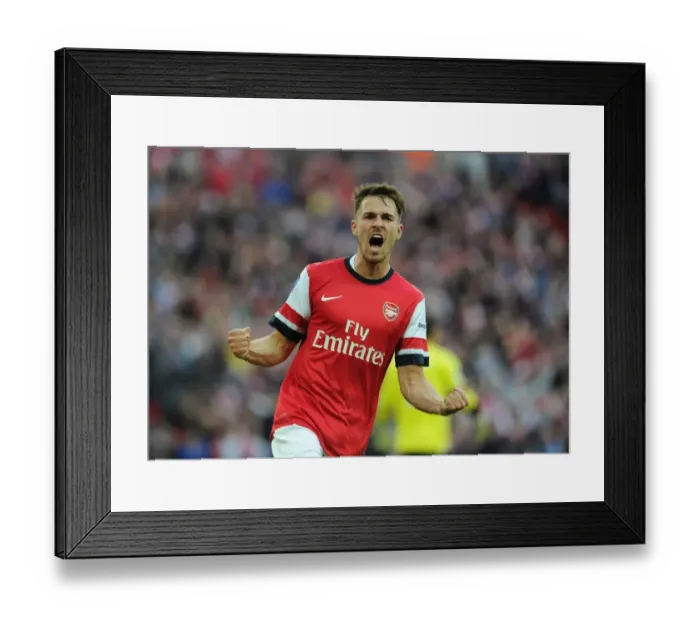 Framed Print : Aaron Ramsey's Euphoric Moment: Thrilling FA Cup Semi-Final Goal for Arsenal vs Wigan Athletic (2014) Framed Print : Aaron Ramsey's Euphoric Moment: Thrilling FA Cup Semi-Final Goal for Arsenal vs Wigan Athletic (2014)