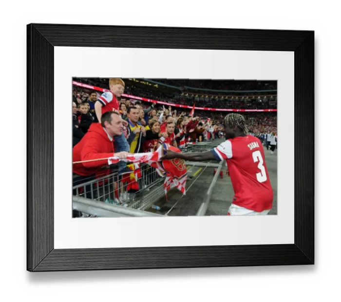 Framed Print : Arsenal's Bacary Sagna Embraces Fan with Team Flag after FA Cup Semi-Final Victory Framed Print : Arsenal's Bacary Sagna Embraces Fan with Team Flag after FA Cup Semi-Final Victory