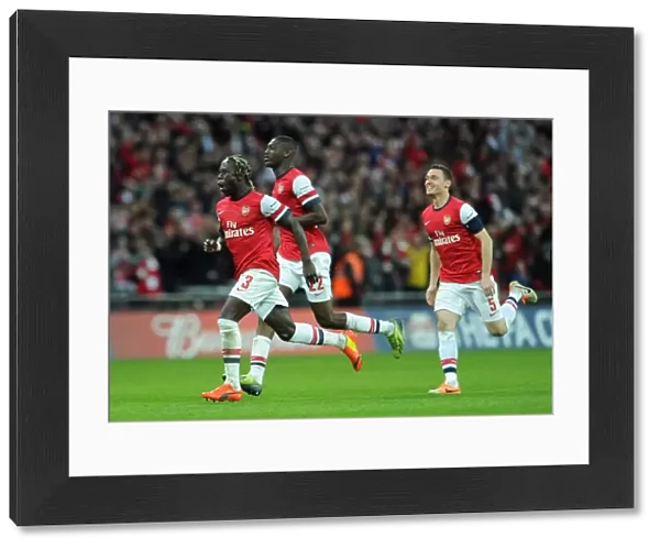 Bacary Sagna (Arsenal) celebrates winning the penalty shoot out. Arsenal 1: 1 Wigan Athletic