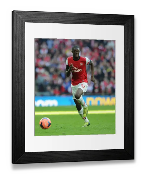 Framed Print : Yaya Sanogo in Action: Arsenal's FA Cup Semi-Final Battle against Wigan Athletic, 2014