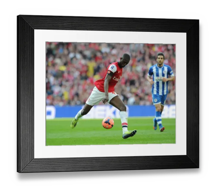 Framed Print : Yaya Sanogo's FA Cup Semi-Final Showdown: Arsenal vs. Wigan Athletic, 2014
