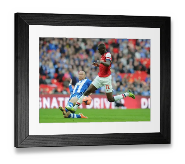 Framed Print : Clash at Wembley: Yaya Sanogo vs. Stephen Crainey - FA Cup Semi-Final Showdown