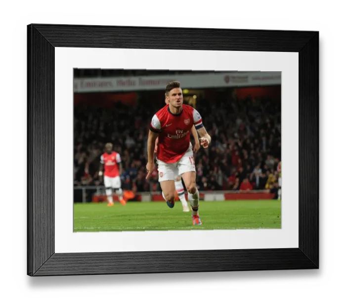 Framed Print : Olivier Giroud celebrates scoring his goal for Arsenal. Arsenal 3: 1 West Ham United