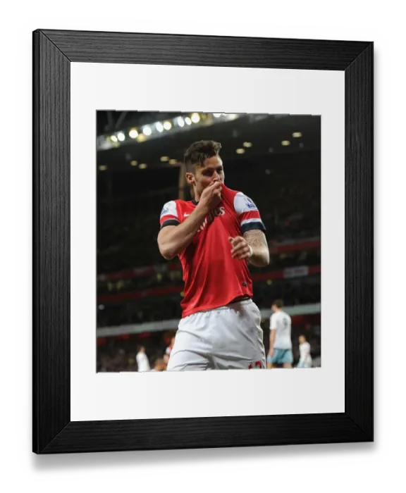 Framed Print : Olivier Giroud's Double: Thrilling Arsenal Victory over West Ham United in the Premier League (April 2014)