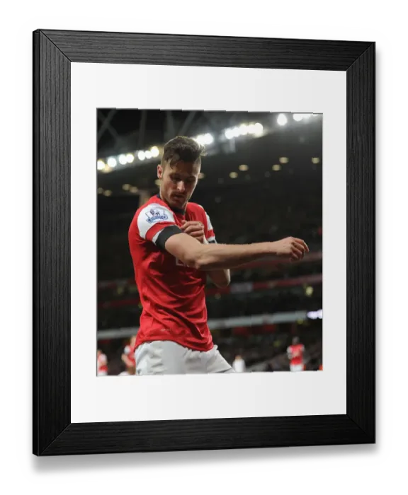 Framed Print : Olivier Giroud's Double: Thrilling Arsenal Victory Over West Ham United in the Premier League (April 2014) Framed Print : Olivier Giroud's Double: Thrilling Arsenal Victory Over West Ham United in the Premier League (April 2014)