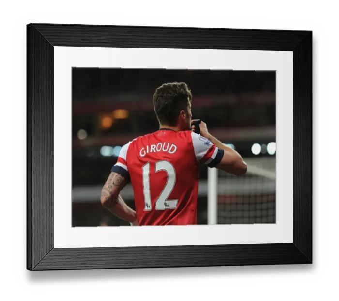 Framed Print : Olivier Giroud's Double: Thrilling Arsenal Victory Over West Ham United in the Premier League (April 2014)