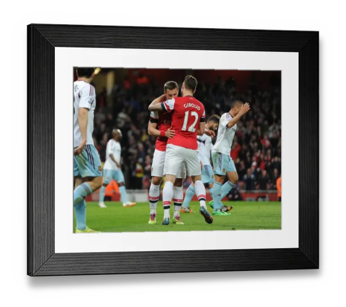 Framed Print : Lukas Podolski celebrates scoring his and Arsenals 1st goal with Olivier Giroud