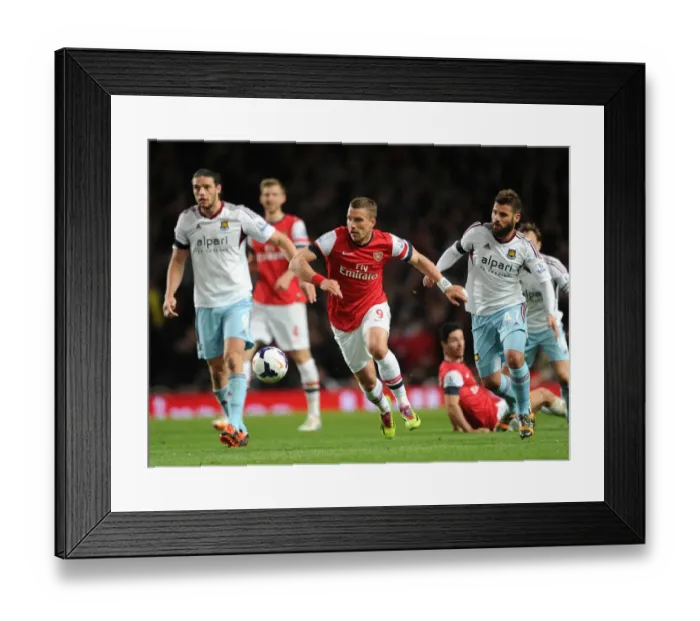 Framed Print : Arsenal vs. West Ham: Podolski Clashes with Nocerino and Carroll Framed Print : Arsenal vs. West Ham: Podolski Clashes with Nocerino and Carroll