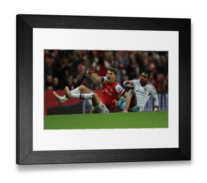 Framed Print : Intense Rivalry: Ramsey vs. Vaz Te Showdown in Arsenal vs. West Ham Premier League Clash Framed Print : Intense Rivalry: Ramsey vs. Vaz Te Showdown in Arsenal vs. West Ham Premier League Clash