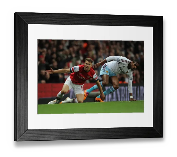 Framed Print : Intense Rivalry: Ramsey vs. Vaz Te Clash in Arsenal's Battle against West Ham