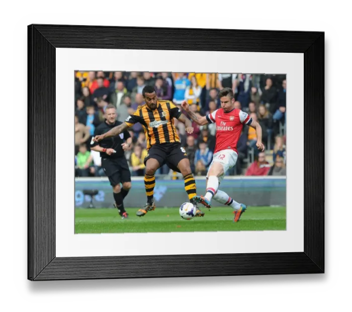 Framed Print : Giroud vs. Huddlestone: Intense Battle in Hull City vs. Arsenal Premier League Clash