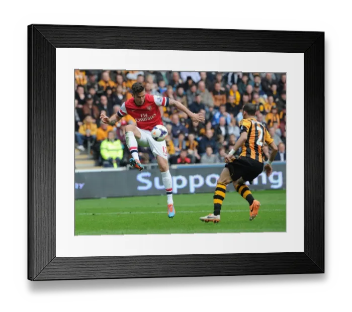 Framed Print : Giroud vs. Rosenior: Intense Battle in Hull City vs. Arsenal Premier League Clash