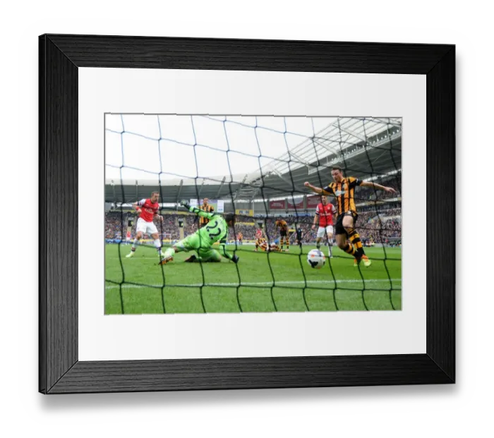 Framed Print : Lukas Podolski Scores His Second Goal Against Hull City, Arsenal Leads 3-0 Framed Print : Lukas Podolski Scores His Second Goal Against Hull City, Arsenal Leads 3-0