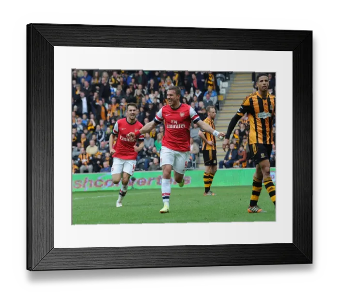 Framed Print : Podolski and Ramsey's Epic Goal Celebration: Arsenal's Unforgettable Win Against Hull City (2014) Framed Print : Podolski and Ramsey's Epic Goal Celebration: Arsenal's Unforgettable Win Against Hull City (2014)
