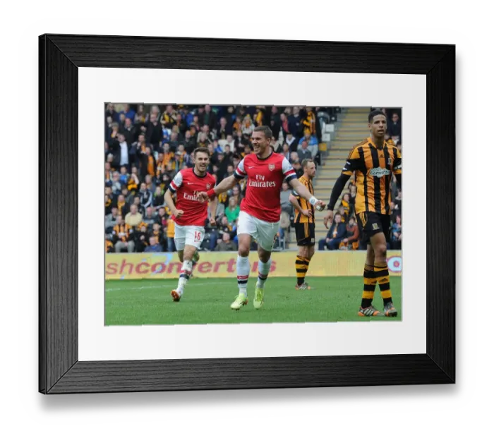 Framed Print : Podolski and Ramsey Celebrate Arsenal's Victory: Hull City vs Arsenal, Premier League 2013 / 14