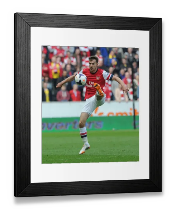Framed Print : Aaron Ramsey in Action: Arsenal vs Hull City, Premier League 2013-2014 Framed Print : Aaron Ramsey in Action: Arsenal vs Hull City, Premier League 2013-2014