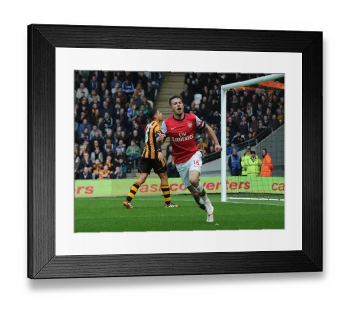 Framed Print : Euphoria Unleashed: Aaron Ramsey's Thrilling Goal Celebration vs. Hull City, Premier League 2013-2014