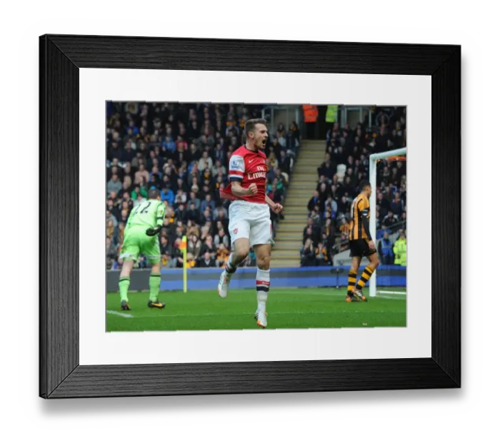 Framed Print : Euphoria Unleashed: Aaron Ramsey's Thrilling Goal Celebration vs. Hull City, Premier League 2013-2014