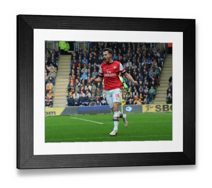 Framed Print : Aaron Ramsey's Euphoric Goal Celebration: Hull City vs. Arsenal, Premier League 2013 / 14 Framed Print : Aaron Ramsey's Euphoric Goal Celebration: Hull City vs. Arsenal, Premier League 2013 / 14