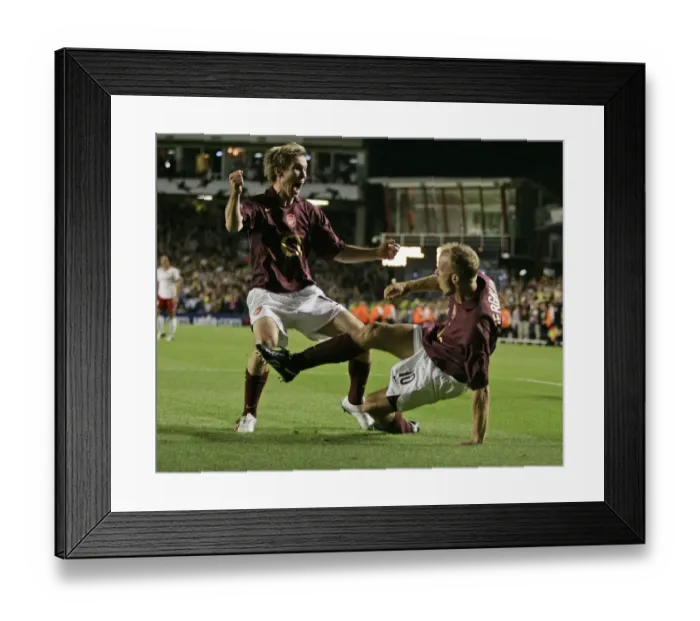 Framed Print : Dennis Bergkamp's Stunning Goal: Arsenal Leads FC Thun 2-1 in Champions League (September 14, 2005)