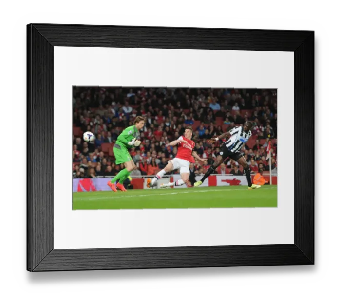 Framed Print : Koscielny Stuns Newcastle: The Thrilling Moment Arsenal's Defender Scores Past Krul and Sissoko