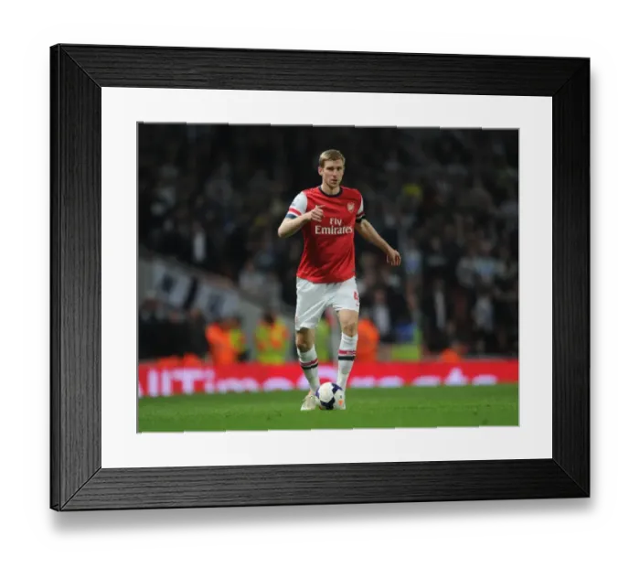 Framed Print : Per Mertesacker (Arsenal). Arsenal 2: 0 Newcastle United. Barclays Premier League