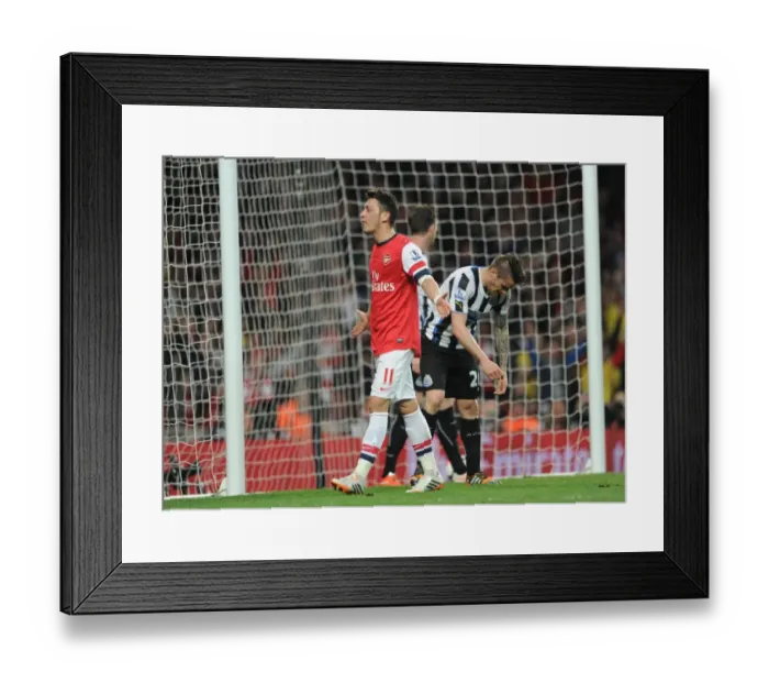 Framed Print : Mesut Ozil celebrates scoring Arsenals 2nd goal. Arsenal 2: 0 Newcastle United. Barclays