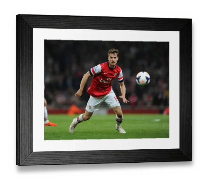 Framed Print : Aaron Ramsey in Action: Arsenal vs Newcastle United, Premier League 2013-2014