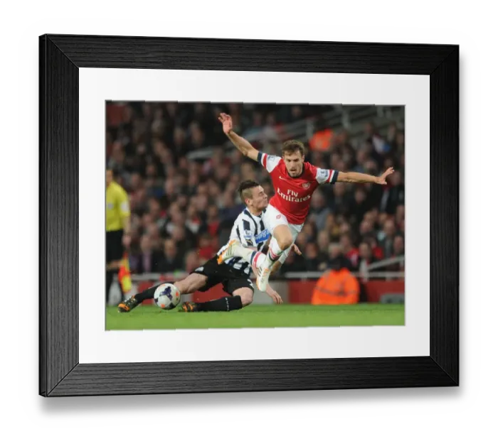 Framed Print : Arsenal's Aaron Ramsey Fouls by Newcastle's Mathieu Debuchy: Intense Moment from the 2013 / 14 Premier League Match Framed Print : Arsenal's Aaron Ramsey Fouls by Newcastle's Mathieu Debuchy: Intense Moment from the 2013 / 14 Premier League Match