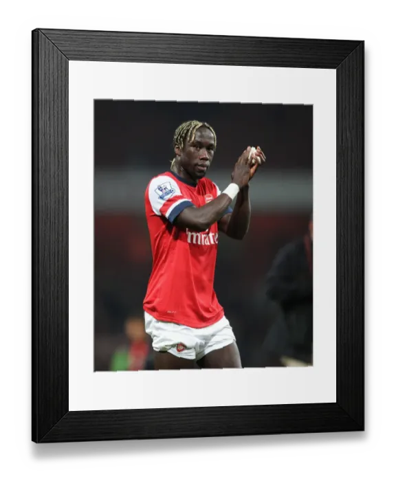 Framed Print : Arsenal's Bacary Sagna Celebrates with Fans after Arsenal v Newcastle United Win