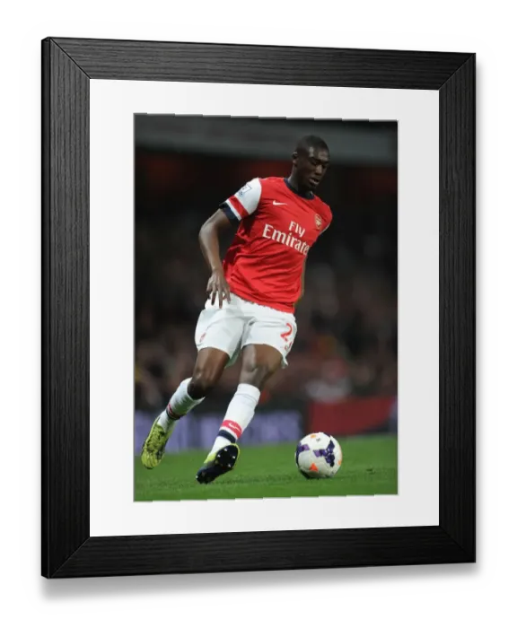 Framed Print : Yaya Sanogo in Action: Arsenal vs Newcastle United, Premier League 2013-14