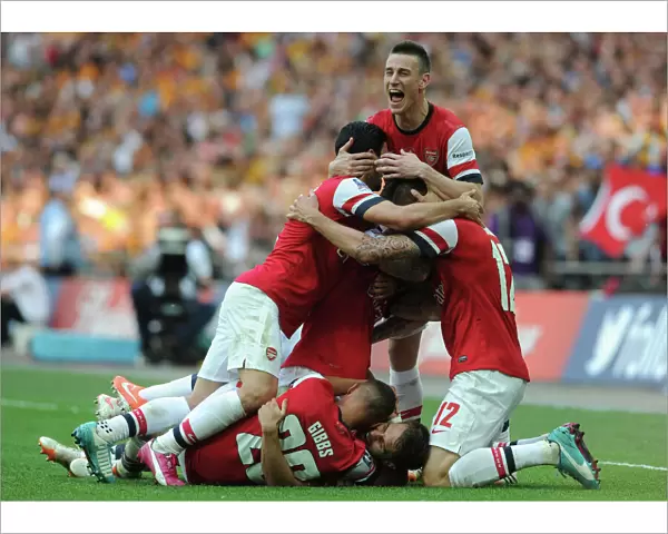 Arsenal's FA Cup Triumph: Ramsey's Hat-Trick and Euphoric Team Celebration