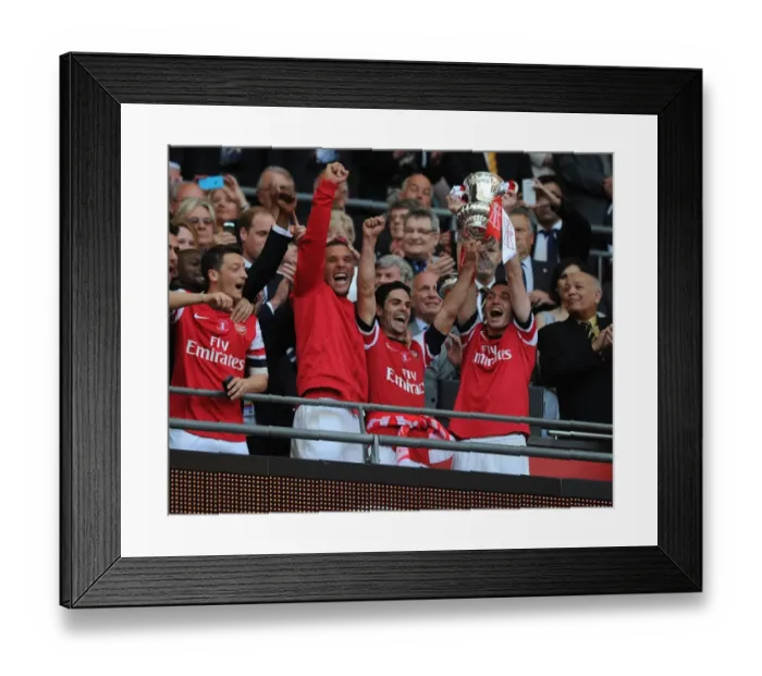 Framed Print : Arsenal Celebrate FA Cup Victory: Ozil, Podolski, Arteta & Vermaelen Lift the Trophy Framed Print : Arsenal Celebrate FA Cup Victory: Ozil, Podolski, Arteta & Vermaelen Lift the Trophy