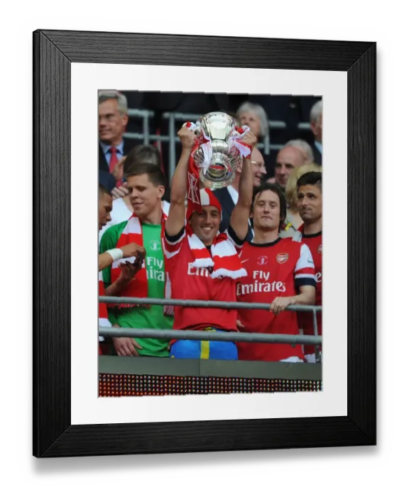 Framed Print : Arsenal's Santi Cazorla Lifts FA Cup after Arsenal v Hull City Victory