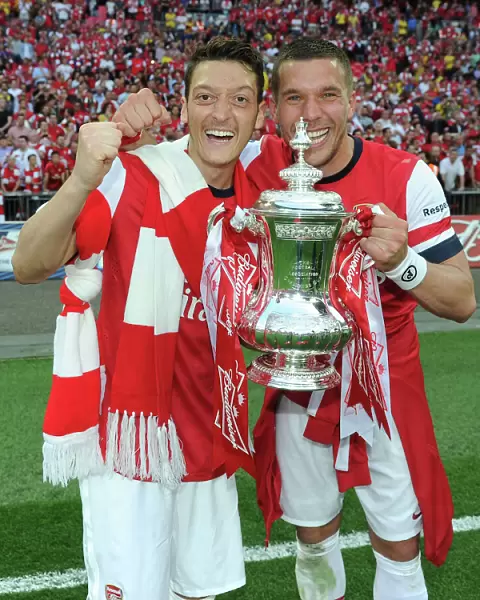Arsenal FC: Celebrating FA Cup Victory - Ozil and Podolski's Triumph