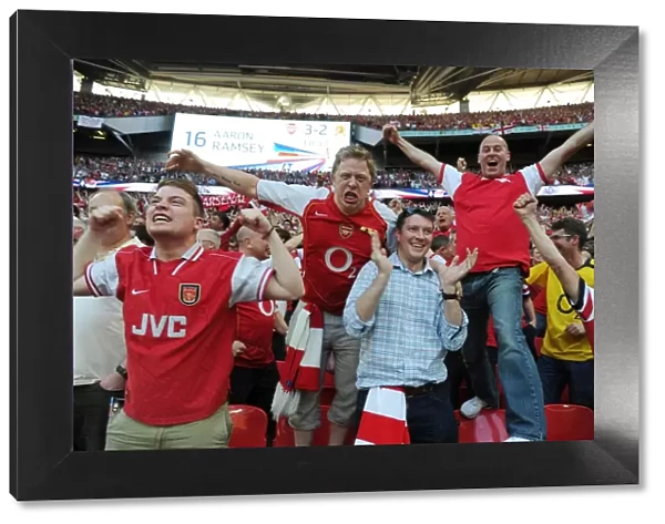 Arsenal's FA Cup Triumph: Fans Celebrate Third Goal vs. Hull City (2014)