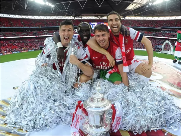 Arsenal FC's Jubilant FA Cup Victory: Olivier Giroud, Bacary Sagna, Aaron Ramsey, and Mathieu Celebrate