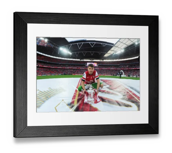 Framed Print : Aaron Ramsey Lifts FA Cup: Arsenal's Triumph over Hull City Framed Print : Aaron Ramsey Lifts FA Cup: Arsenal's Triumph over Hull City