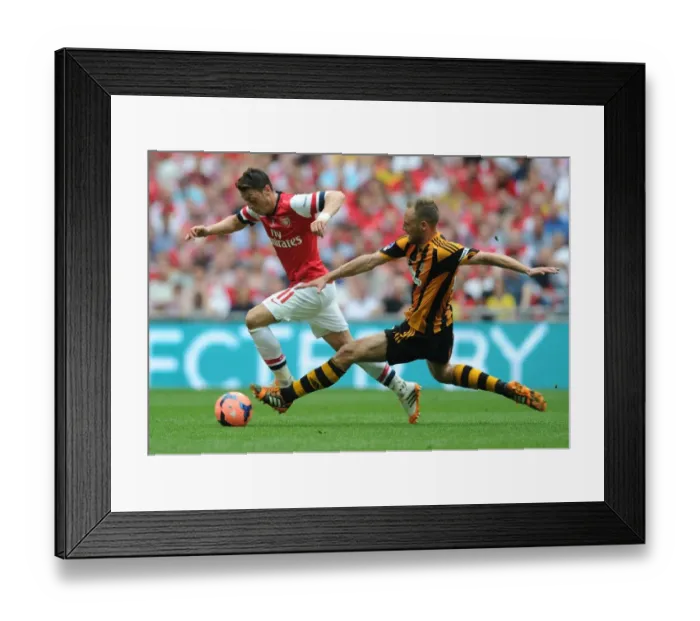 Framed Print : Clash of Stars: Ozil vs Meyler at the FA Cup Final - Arsenal vs Hull City Framed Print : Clash of Stars: Ozil vs Meyler at the FA Cup Final - Arsenal vs Hull City