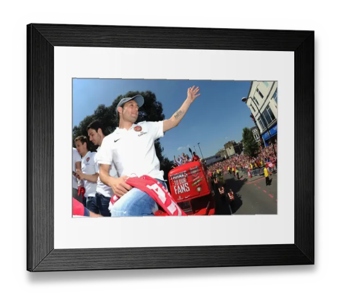 Framed Print : Arsenal FC: Santi Cazorla Celebrates FA Cup Victory during 2014 Parade in London Framed Print : Arsenal FC: Santi Cazorla Celebrates FA Cup Victory during 2014 Parade in London