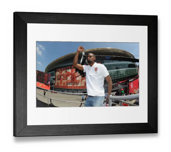 Framed Print : Arsenal FA Cup Victory: Abou Diaby's Triumph at the 2014 Parade