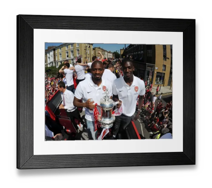 Framed Print : Arsenal FA Cup Victory: Abou Diaby and Yaya Sanogo Celebrate with the Trophy