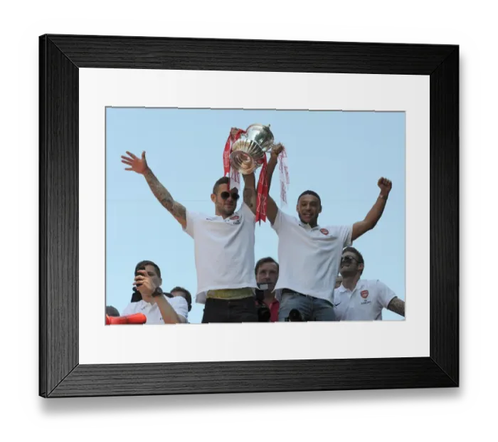 Framed Print : Arsenal Champions: Jack Wilshere and Alex Oxlade-Chamberlain Celebrate Victory on the Trophy Parade, Islington (May 18, 2014) Framed Print : Arsenal Champions: Jack Wilshere and Alex Oxlade-Chamberlain Celebrate Victory on the Trophy Parade, Islington (May 18, 2014)