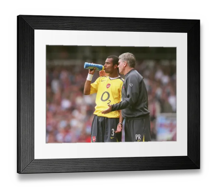 Framed Print : Ashley Cole (Arsenal) and Assistant Manager Pat Rice Framed Print : Ashley Cole (Arsenal) and Assistant Manager Pat Rice