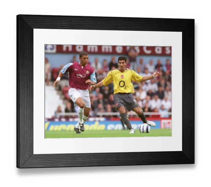 Framed Print : Jose Reyes (Arsenal) Hayden Mullins (West Ham). West Ham United 0: 0 Arsenal